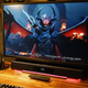 El videojuego Metal: Hellsinger junto a la barra de sonido SoundBlaster V2X